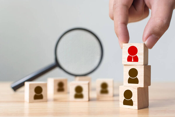 Human resource and talent management and recruitment business building team, Personal development of employee in organization. Hand putting wood cube block on top, Copy space
