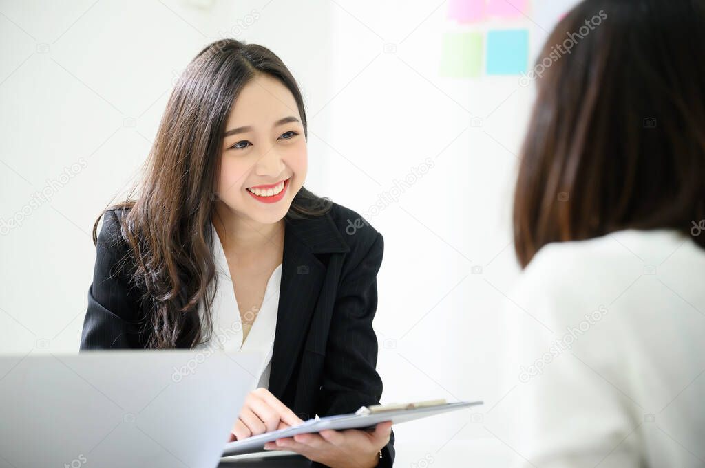 Job interview, We are hiring, Human resource and recruitment concept. Beautiful young asian businesswoman talking applicant people