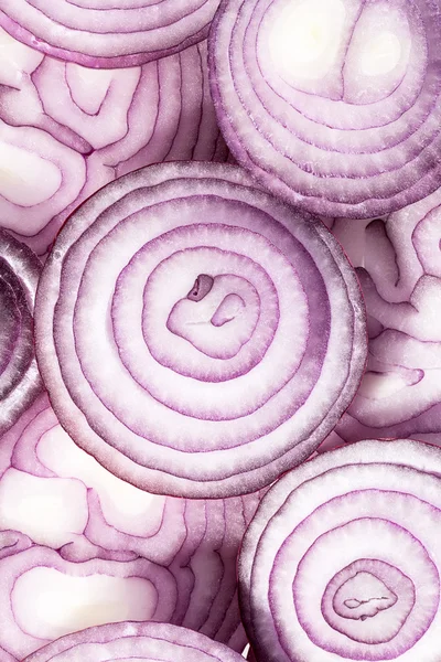 Background of red onion slices Stock Photo