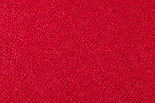 Fond rouge de tissu, une couleur, la texture du matériau — Photo
