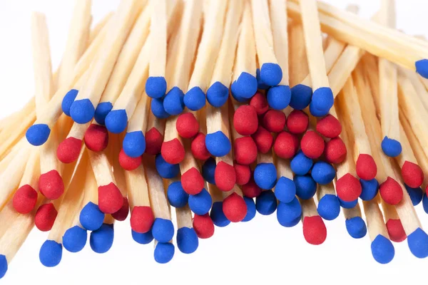 Heap of matches with red and blue heads isolated on white background — Stock Photo, Image