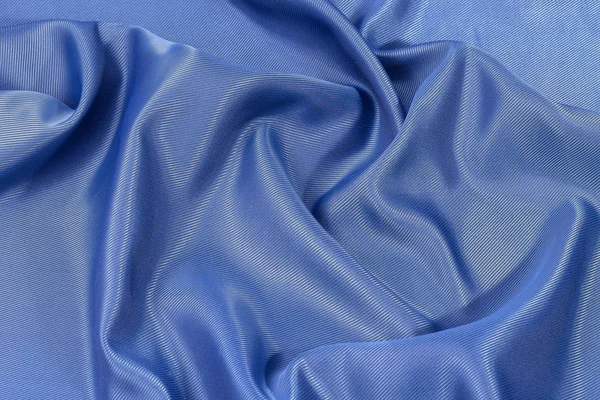 シルクの背景、青色の光沢のある生地の質感をクローズ アップ — ストック写真