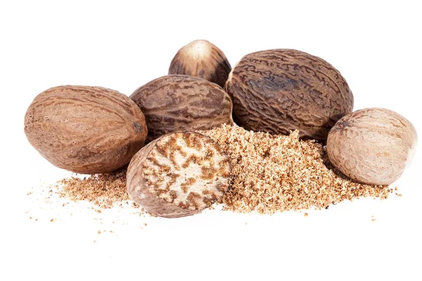 Nutmeg ,  half and ground on white background, close up — Stock Photo, Image