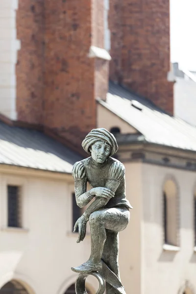 Студентка-фигурка, фонтан на площади Святой Марии, Краков, Польша — стоковое фото
