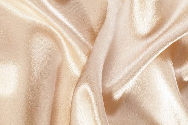 İpek arka plan, bej parlak kumaş dokusuna