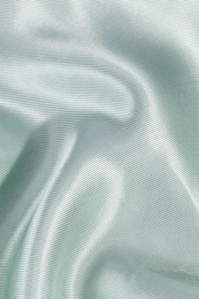Silk background, texture of green ribbed  shiny fabric — Stock Photo, Image