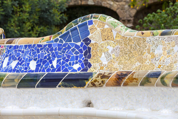 Gaudi multicolored mosaic bench  in Park Guell; Barcelona; Spain