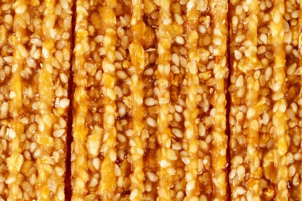 Background of sesame seed cookies, close up. — Stock Photo, Image