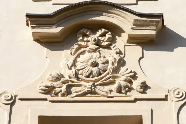 Relief on facade of old building, floral motif, Prague, Czech  Republic