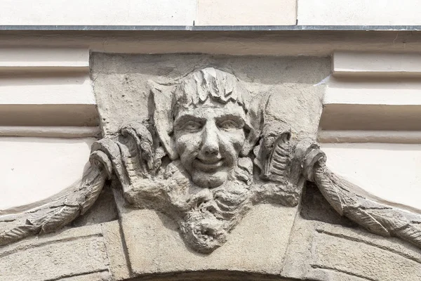 Relief on facade of old building, man's face, Prague, Czech Republic — Stock Photo, Image