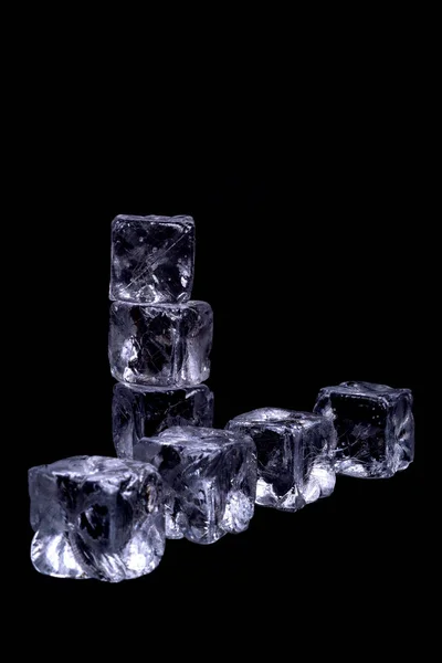 Ice cubes on black background — Stock Photo, Image