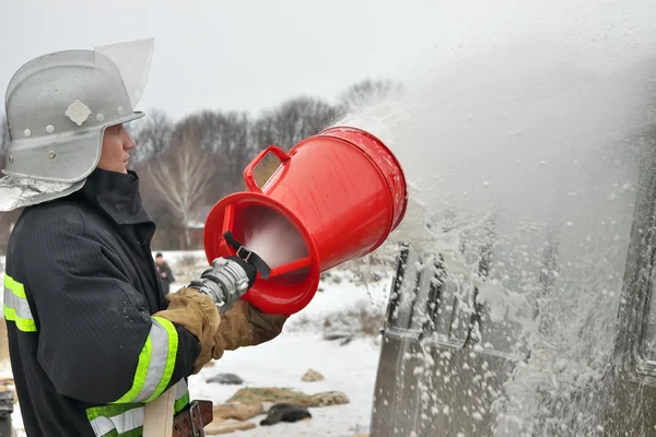 Firefighter in action — Stock Photo, Image