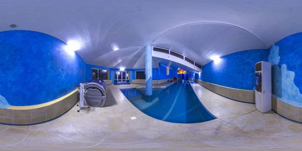 WARSAW, POLAND - JANUARY 3 2017 indoor swimming pool with solarium in hotel . 3D spherical panorama with 360 viewing angle.  Ready for virtual reality or VR. Full equirectangular projection. — Stock Photo, Image