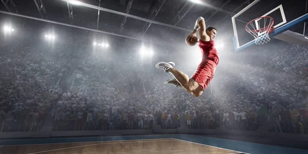 Basketball player makes slam dunk — Stock Photo, Image