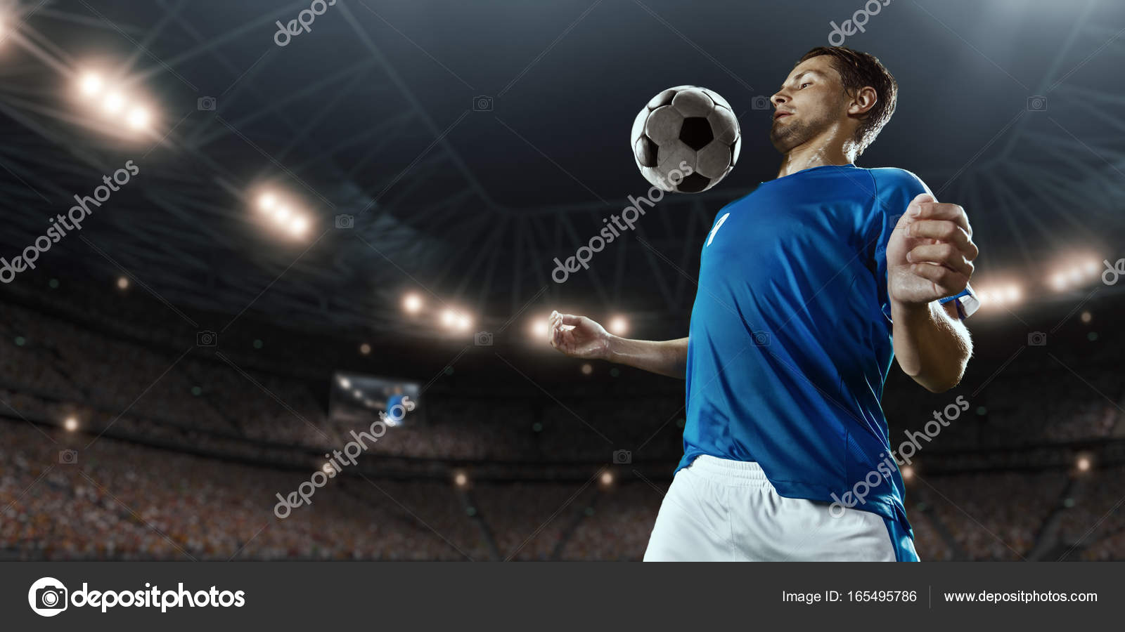 Soccer player heads ball on hi-res stock photography and images