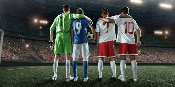 Soccer players on a professional stadium — Stock Photo, Image