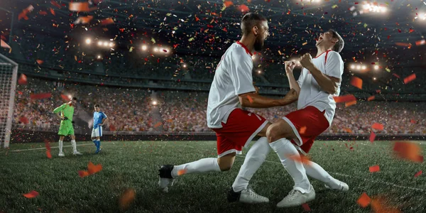 Soccer players happy after victory — Stock Photo, Image