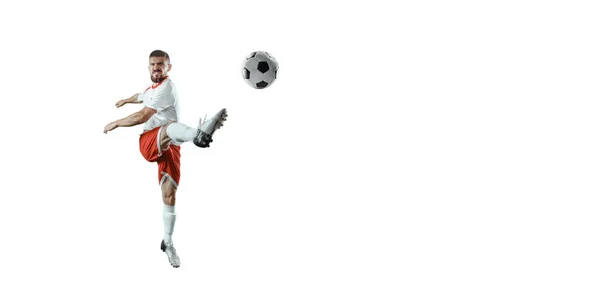 Jogador de futebol em um fundo branco — Fotografia de Stock