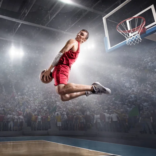 Basketball player makes slam dunk — Stock Photo, Image