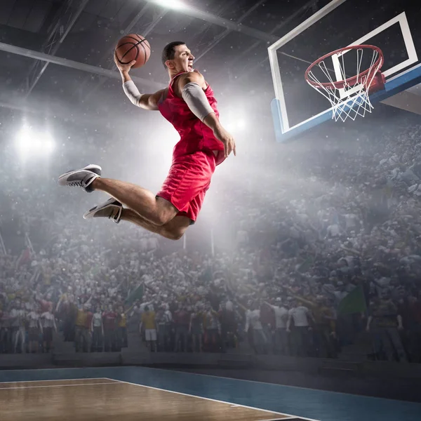 Basketball player makes slam dunk — Stock Photo, Image