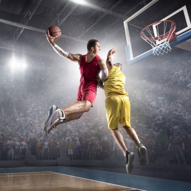 Basketball players on big professional arena makes slam dunk clipart