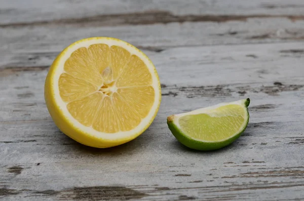 lemons cut open on a cutting board.