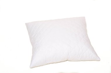 Beyaz arka plandaki beyaz yastığı kapat