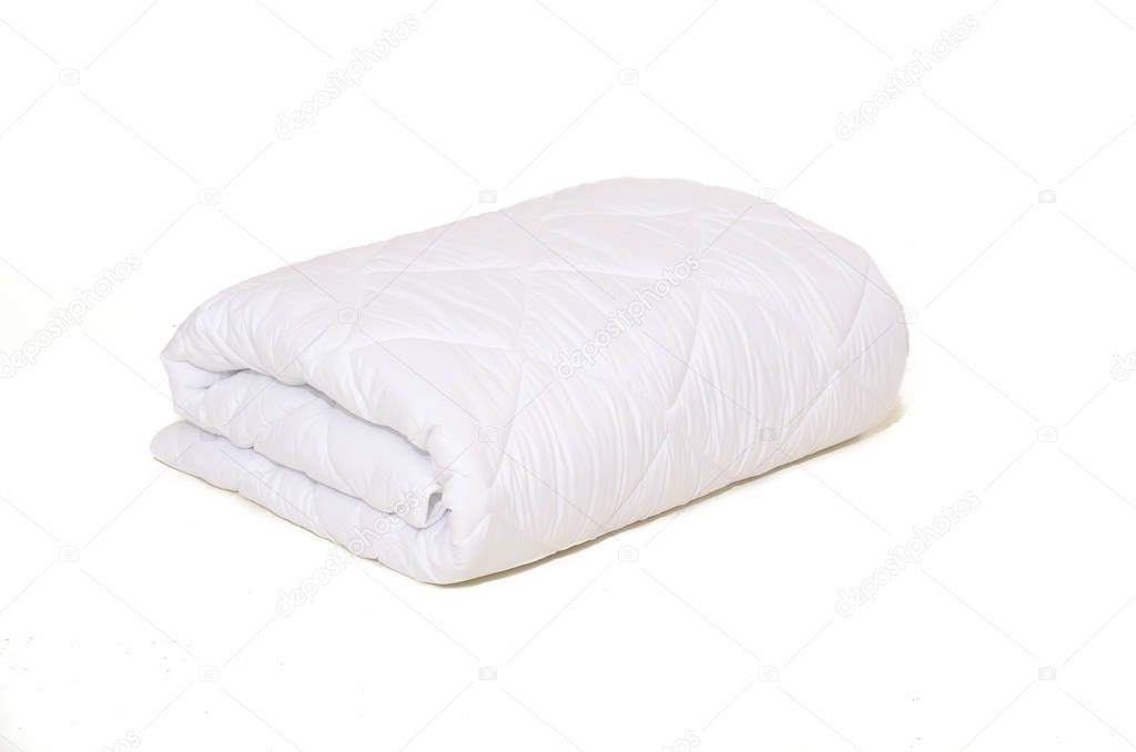 Rolled white duvet cover on white isolated background