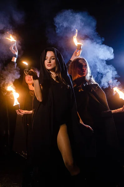 Mystery Young Girls Wearing Black Cloaks Witch Sabbath Woods Night — Stockfoto
