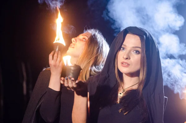 Mystery Young Girls Wearing Black Cloaks Witch Sabbath Woods Night — Stockfoto