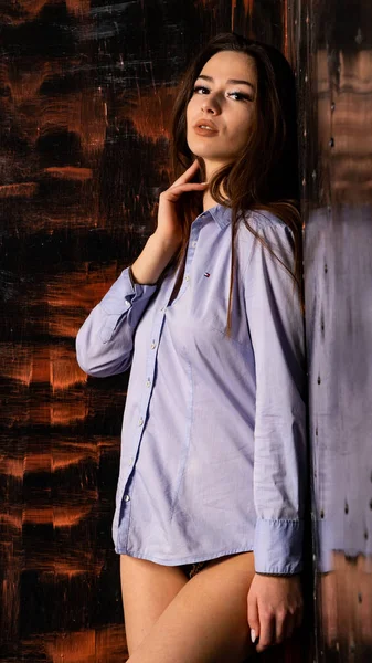 Beautiful sexy girl posing lilac shirt — Stock Photo, Image