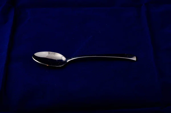 Silver Metal Spoon Textile Background — Stock Photo, Image