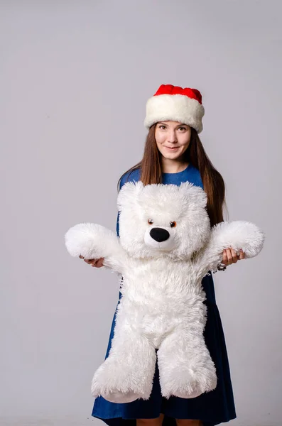 Mooie gelukkige vrouw in Santa Claus kleding — Stockfoto