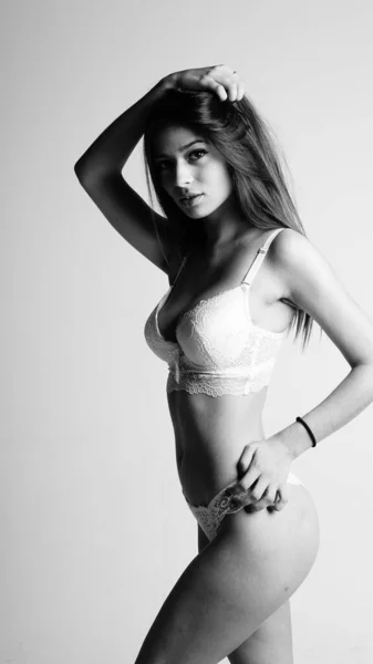 Girl in lingerie on white background — Stock Photo, Image