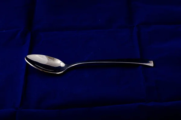 Silver Metal Spoon Textile Background — Stock Photo, Image