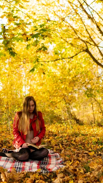 Gorgeous red hair girl in red bodysuit and coat. Young woman walking in park — 스톡 사진