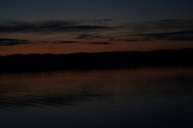 picturesque view of endless sea with beautiful sunrise at sky 