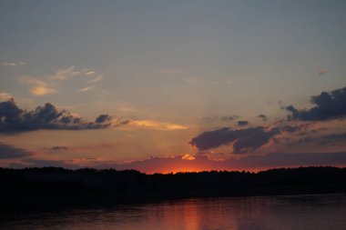 picturesque view of endless sea with beautiful sunrise at sky 