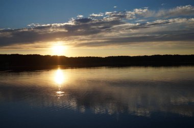 picturesque view of endless sea with beautiful sunrise at sky 