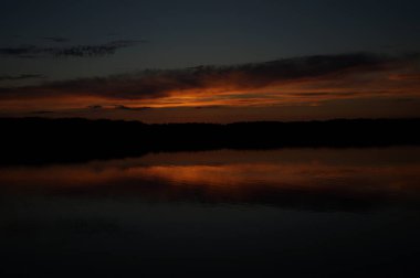 picturesque view of endless sea with beautiful sunrise at sky 