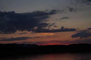 picturesque view of endless sea with beautiful sunrise at sky 