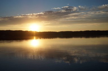 picturesque view of endless sea with beautiful sunrise at sky 