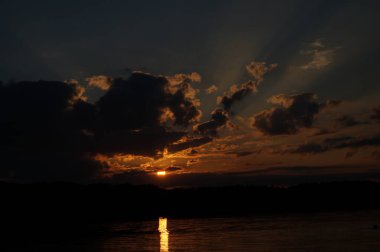 picturesque view of endless sea with beautiful sunrise at sky 