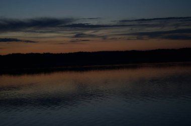 picturesque view of endless sea with beautiful sunrise at sky 
