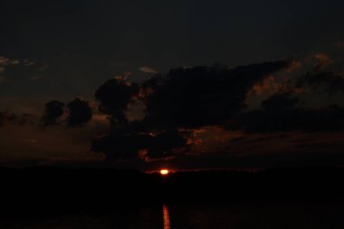 picturesque view of endless sea with beautiful sunrise at sky 