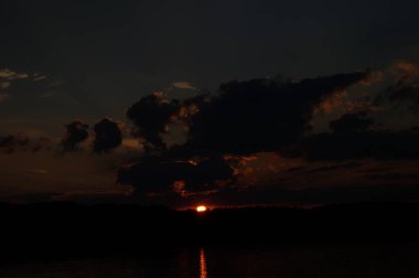 picturesque view of endless sea with beautiful sunrise at sky 