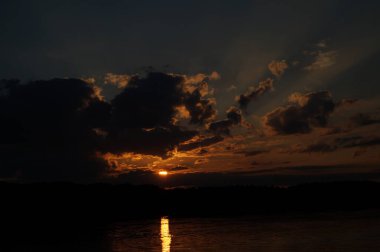 picturesque view of endless sea with beautiful sunrise at sky 