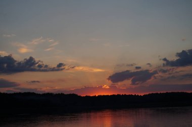 picturesque view of endless sea with beautiful sunrise at sky 