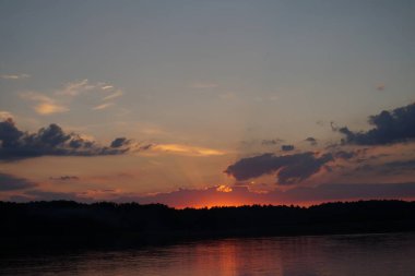 picturesque view of endless sea with beautiful sunrise at sky 