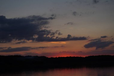 picturesque view of endless sea with beautiful sunrise at sky 